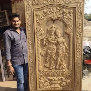 Devotional Relief Carved Wooden Door Design